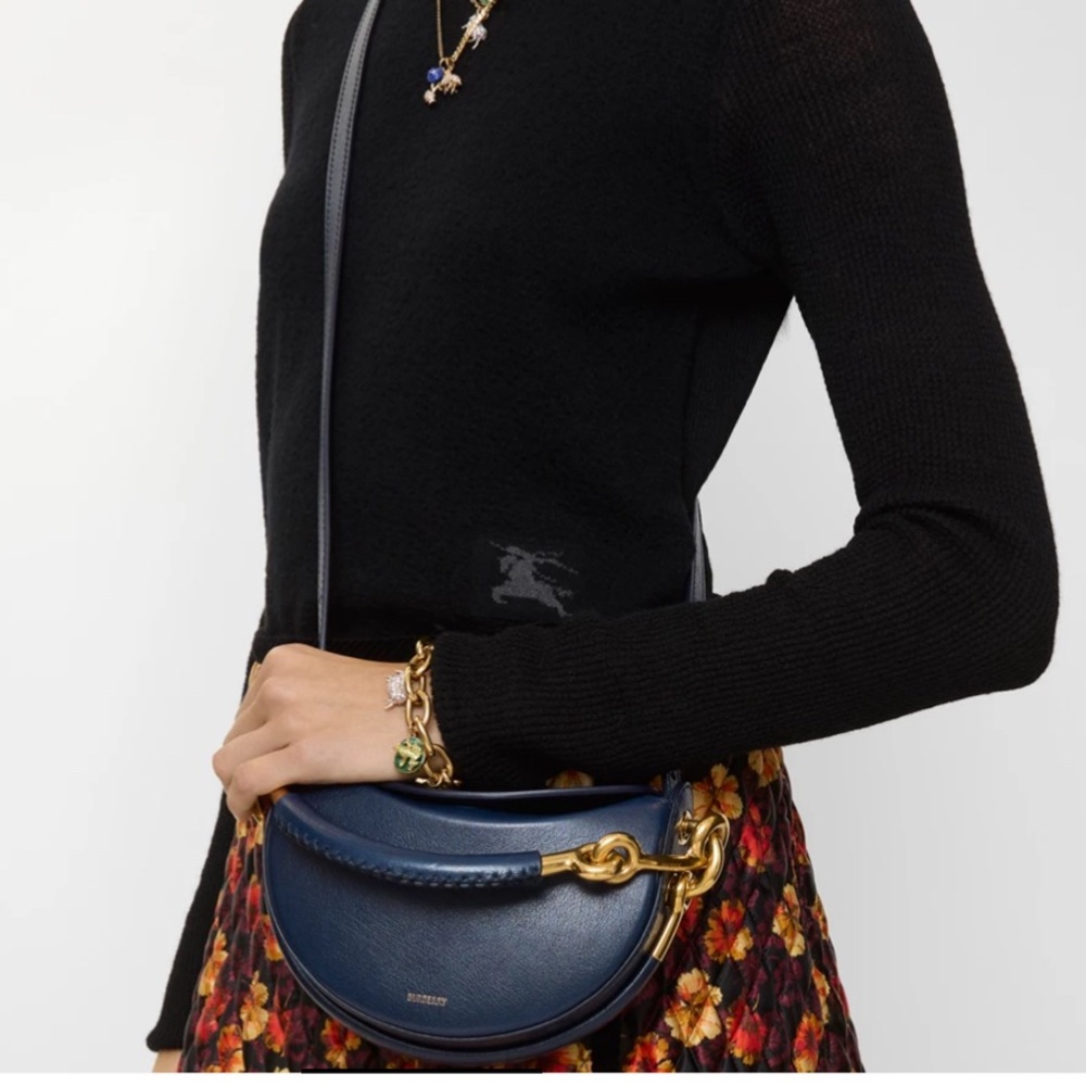 Burberry Bridle Leather Crossbody
Navy Mini Bag with Gold Accents - Picture 2 of 5